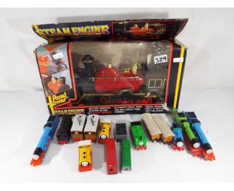 Model Railways - A quantity of diecast Thomas the Tank Engine trains by ERTL, a steam engine battery operated mystery action 