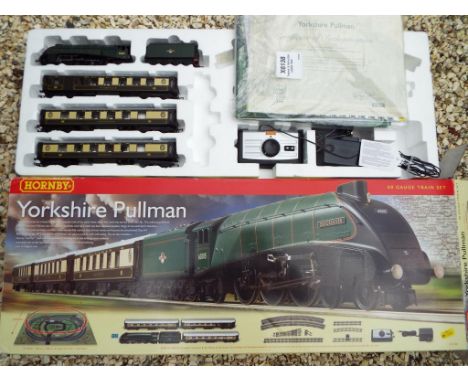Model Railways - A Hornby OO gauge train set, Yorkshire Pullman, comprising 4-6-2 'Quicksilver' op no 60015 locomotive with t