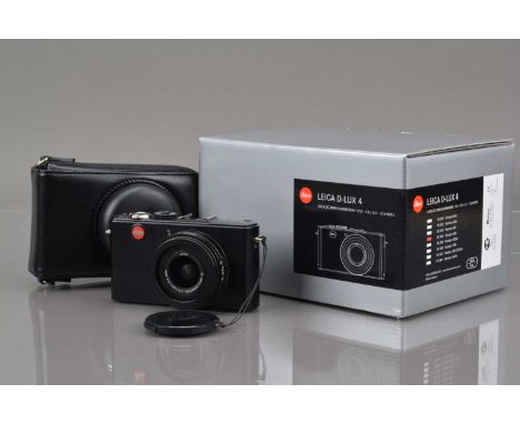 A Leica D-LUX 4 Digital Camera, black, shutter working, flash working, self timer working, display working, body VG, with DC 