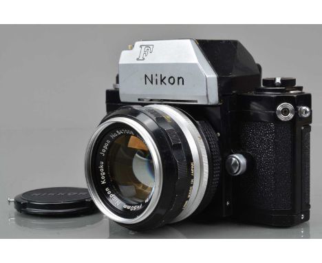 A Nikon F SLR Camera, black, serial no 6832437, shutter working, self timer working, body G, some marks to base plate, with c