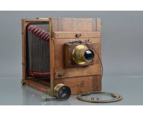 A Restored 17cm x 23¼cm Tailboard Camera, appears stripped & re stained, new pieces front panel, black canvas bellows, red co