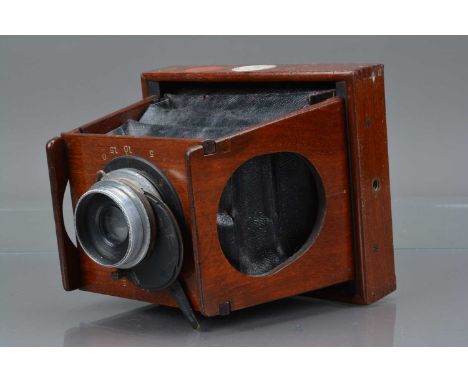 A J F Shew Eclipse Apparatus Strut Mahogany Quarter Plate Camera, No 4102, body G, some scratches & wear, bellows G, shutter 