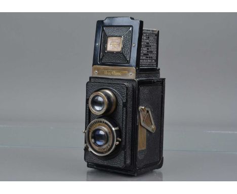 A Zeiss Ikon Ikoflex II TLR Camera, with focus lever, shutter working, body G, some brassing to edges, name plate, lens panel