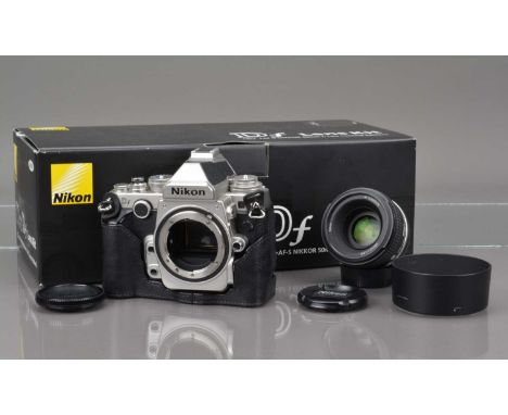 A Nikon Df DSLR Camera, silver, serial no 6007567, shutter count 1,429, shutter working, display working, self timer working,