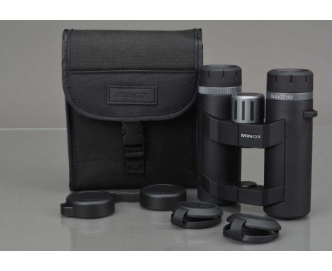 A Pair of Minox BL 8x33 HD Binoculars, body VG-E, elements VG-E, with front/rear caps, Minox case, manual, in maker's box