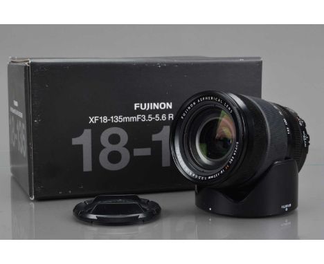 A Fujinon Super EBC XF 18-135mm f/3.5-5.6R LM OIS WR Aspherical Lens, auto focusing working, barrel G-VG, elements VG, with f