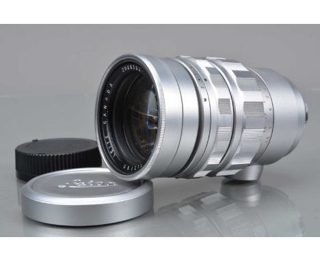 A Leitz Canada 90mm f/2 Summicron Lens, M mount, serial no 2068554, 1964, barrel G-VG, elements G-VG, with front and rear cap