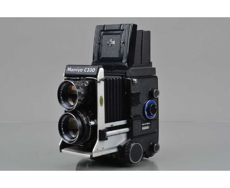 A Mamiya C330 Professional S TLR Camera, serial no W 203947, body G-VG, light paint wear to top edge, film door edge, bellows