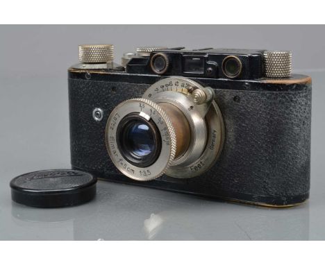 A Leitz Wetzlar Leica I Mod C Camera, later factory conversion to model II D, with sync socket, serial no 42841, 1930,  shutt