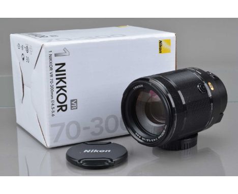 A Nikon 1 Nikkor VR 70-300mm f/4.5-5.6 Lens,  black, Nikon 1 mount, auto focusing working, barrel VG, elements VG, with HB-N1