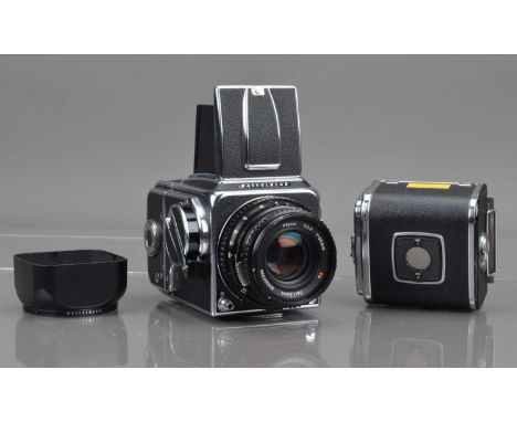 A Hasselblad 500C Camera, chrome, serial no UH 126951, shutter working, body G-VG, with Carl Zeiss T* 80mm f/2,8 black lens, 