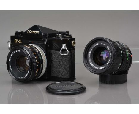 A Canon F-1 SLR Camera, serial no 511044, shutter working, meter working, self timer working, body G, some light wear, with F