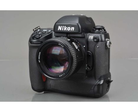 A Nikon F5 SLR Camera, serial no 3011478, shutter working, meter working, camera responsive in settings, drive LED display sh