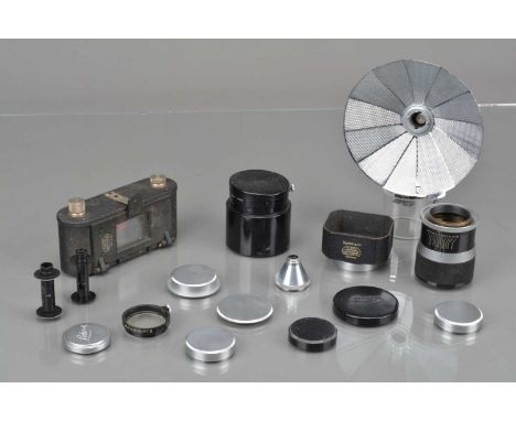 Leitz Accessories, a Summarit hood, with UV filter, lens caps, film spools, L39 body caps, rear L39 caps, COOED focusing moun