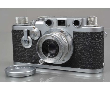 A Leitz Wetzlar Leica IIIf Rangefinder Camera, red dial serial no 688645, 1954, shutter working, self timer working, rangefin