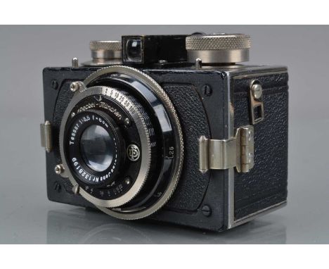 A Kolár Kola Box Camera, 4x4cm format, with 3x4cm mask, body G-VG, some brassing to finder edges, with Carl Zeiss Jena 6cm f/