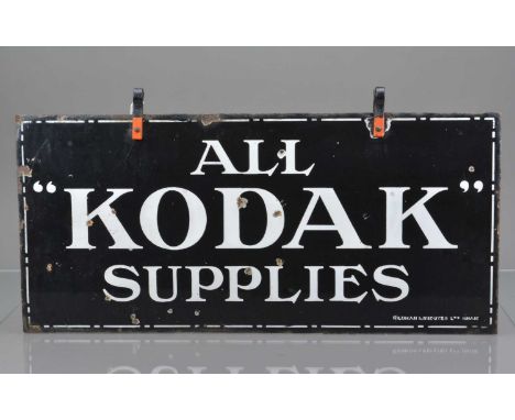 A Kodak Enamelled Shop Sign,  circa 1930, 28'' x 13'' double sided, black & white ''All Kodak Supplies'', made by Wildman & M
