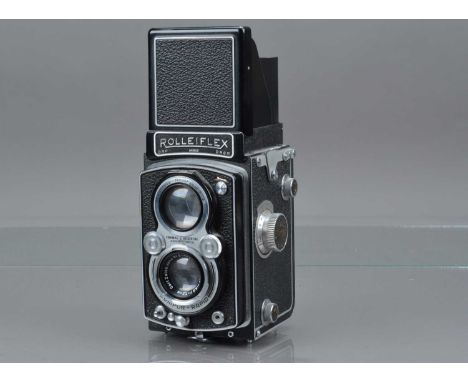 A Rolleiflex Automat TLR Camera, type one, serial no 645609, shutter working, body G, with Carl Zeiss Jena 7.5cm f/3.5 Tessar