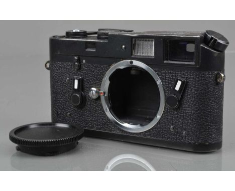 A Leica M4 Rangefinder Camera Body, black, serial no 1380090, 1974, shutter working, self timer working, viewfinder clear, ra