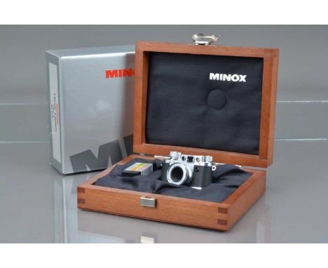 A Minox Classic Camera Leica IIIf Sub Miniature Camera, serial no 525001, shutter working, body VG-E, elements VG-E, with sti