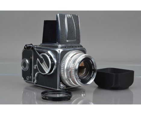 A Hasselblad 500C Camera, chrome, serial no TC 60836, shutter working, body G-VG, with Carl Zeiss 80mm f/2.8 Planar chrome le