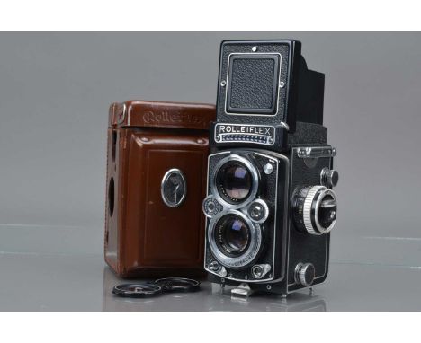 A Rolleiflex 3.5E TLR Camera, type 1, serial no 1746861, shutter working, light cell working, body G-VG, with Carl Zeiss 75mm