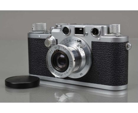 A Leitz Wetzlar Leica IIIf Rangefinder Camera,  red dial, serial no 640367, 1952-53, shutter working, rangefinder working, bo