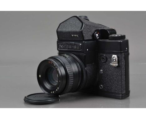 A Kiev 60 Camera,  black, serial no 12390, shutter working, body G, ding to back corner bellow shutter speed dial, later prof