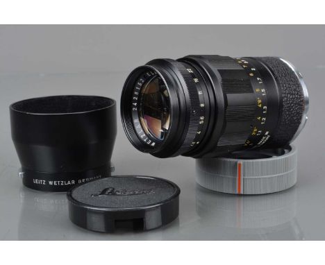 A Leitz Wetzlar 90mm f/2.8 Elmarit Lens, M mount, serial no 2428152, 1970, barrel G-VG, elements G-VG, in lens keeper, with 1