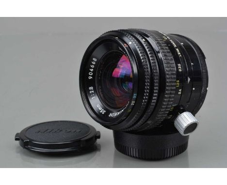 A Nikon PC-Nikkor 35mm f/2.8 Shift Lens, serial no 904668, shift moves freely, barrel G, elements G-VG, with front and rear c