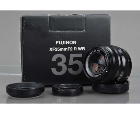 A Fujinon Super EBC XF 35mm f/2R WR Aspherical Lens, auto focusing working, barrel VG, elements VG, with front & rear caps, h