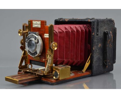 A Sanderson Regular 3¼ x 4¼ Camera, body F-G, scuffs & scratches to leatherette, bellows G, with Ensign Series I No 0 4.75 in