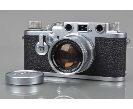 A Leitz Wetzlar Leica IIIf Rangefinder Camera, red dial, serial no 691290, 1954, shutter working, rangefinder working, self t