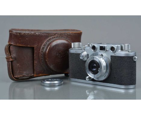 A Leitz Wetzlar Leica IIIc Rangefinder Camera, chrome, serial no 461084, 1948-49, shutter sticking open in slow speeds, worki