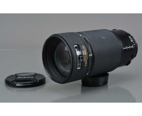 A Nikon ED AF Nikkor 80-200mm f/2.8 Lens, serial no 70745, auto focusing working, barrel G-VG, elements VG, with HN-28 hood, 