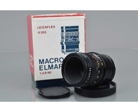 A Leitz Wetzlar Macro Elmarit-R 60mm f/2.8 11 203 Lens, 3 CAM, serial no 3064390, 1980, barrel G-VG, elements VG, in bubble b