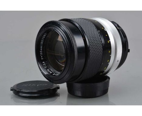 A Nikon Nikkor-Q 135mm f/2.8 Ai Lens, serial no 307057, barrel G, light paint wear to hood rim, elements G-VG, with front and