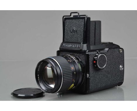 A Mamiya M645 J Camera, serial no L 143365, shutter working, body G, some paint wear to film door edges, with Mamiya Sekor C 