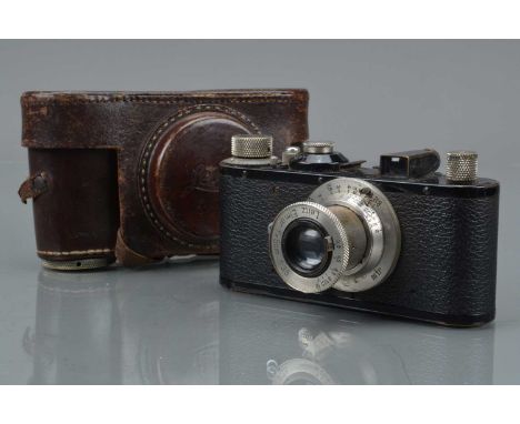 A Leitz Wetzlar Leica I Mod C camera, serial no 210576, 1936, shutter working, not closing on 20-1 of second, body G, factory