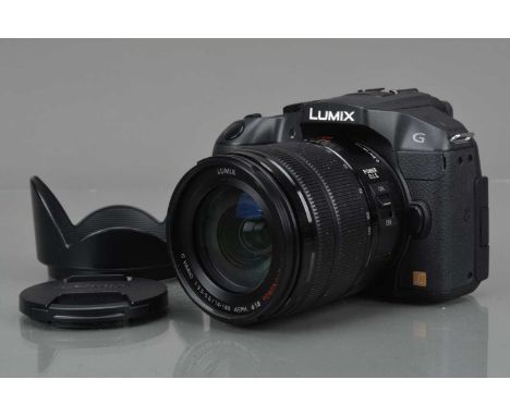 A Panasonic Lumix G6 Digital Camera, black, powers up, shutter working, display screen working, appears to function as should