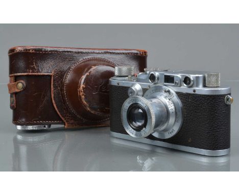 A Leitz Wetzlar Leica IIIa Model G Rangefinder camera, chrome, serial no 304332, 1938, shutter working, range finder function