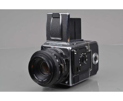 A Hasselblad 201 F Camera,  chrome, serial no 16EC11258, shutter working, body G-VG, with Carl Zeiss T* 80mm f/2.8 Plannar le