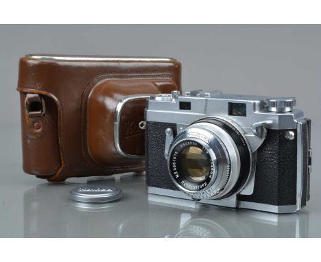 A Konica III Rangefinder Camera, serial no 125249, shutter working, self timer working, rangefinder working, body G-VG, with 