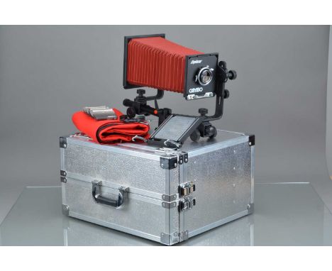 A Cambo Explorer 4x5 mono rail Camera, serial no C 42895, all moves freely, body VG, bellows VG, with Schneider Kreuznach 135