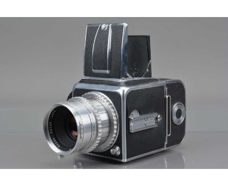 A Hasselblad 1600F Camera, serial no CS 10502, shutter working through speeds, curtain not fully closing, body C, light chrom