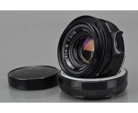 A Leitz Canada 35mm f/2 Summicron-M Lens, M mount, serial no 3165458, 1982, 4th version, barrel G-VG, elements G-VG, with fro