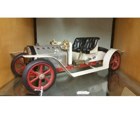 A Vintage Model of an Early 20th Century Motor Car.