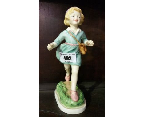 A Royal Worcester Figure 'Thursdays Child has Far to Go'.