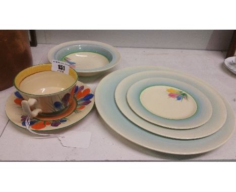 A Clarice Cliff Tea Cup and Saucer; along with other Clarice Cliff Dinner Wares.
