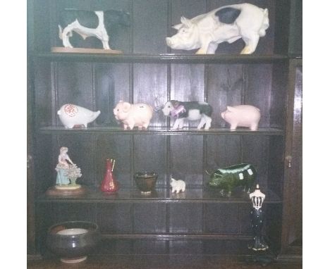 A Quantity of Items to Include a Beswick Friesian Bull, a Royal Albert Plate, a Group of Ceramic Pigs, etc.